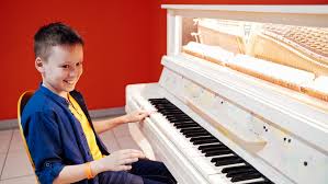 Young Boy Playing Piano